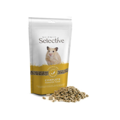 A bag of Science Selective Complete Hamster Food featuring a Syrian hamster on the packaging. The bag is white and yellow, highlighting key product benefits. In front of the bag, a pile of small, cylindrical, pellet-shaped hamster food is displayed.