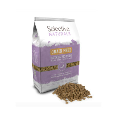 A bag of Selective Naturals Grain Free Guinea Pig Food, made with Timothy hay. The packaging is white and lavender, featuring silhouettes of small animals and key product benefits. In front of the bag, a pile of small, uniform, pellet-shaped guinea pig food is displayed