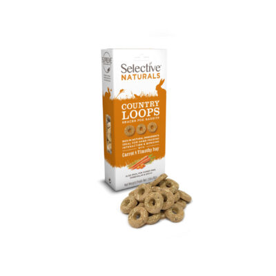 A box of Selective Naturals Country Loops, a snack for rabbits and guinea pigs, in carrot and Timothy hay flavor. The packaging is white and orange, featuring silhouettes of small animals and key product benefits. In front of the box, several beige, ring-shaped treats are displayed.